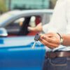 Browsing used car listings on OLX Lebanon website to compare prices